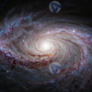 Фотография спиральной галактики с ярким центром и рукавами.