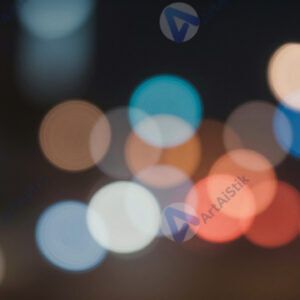 Пёстрый боке‑фон из множества цветных огней разного размера.