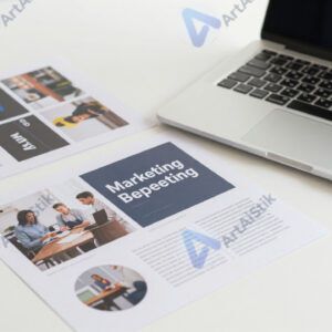 Стол с ноутбуком и графическими распечатками