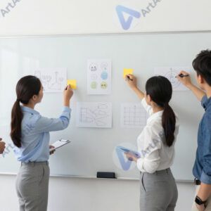 Группа сотрудников у белой доски